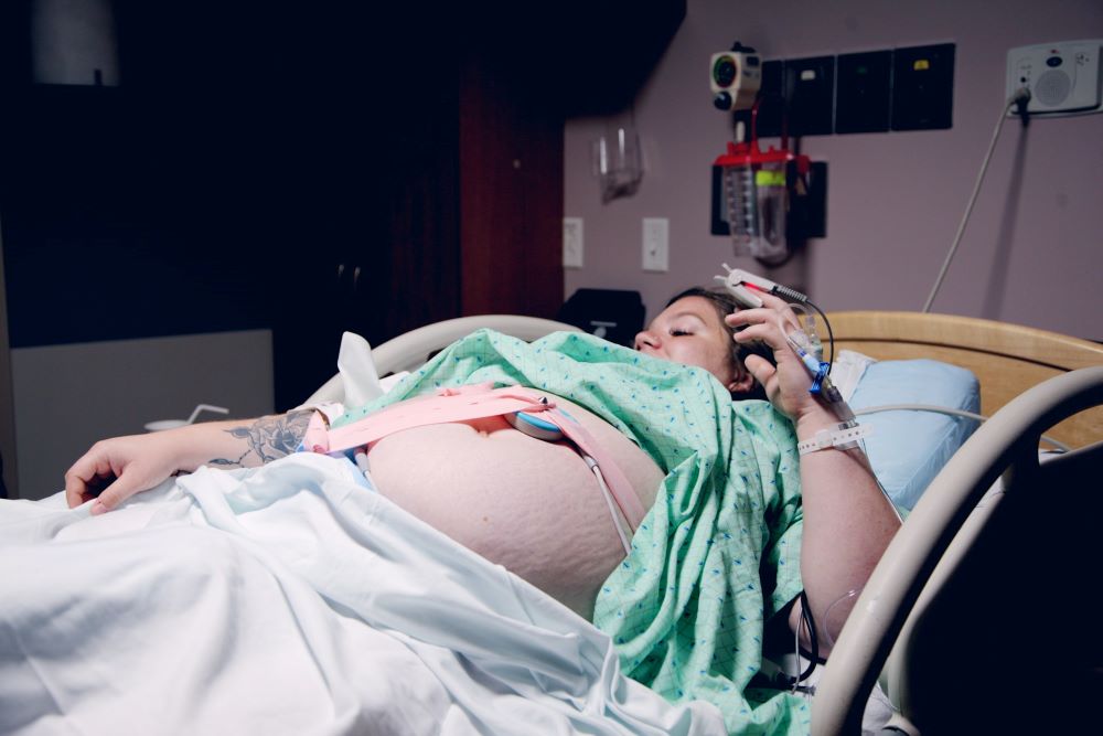 women lying down in hospital