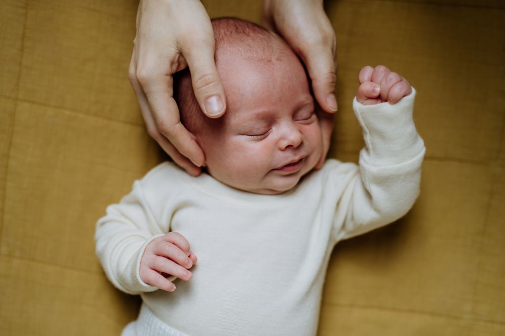 Close-up view of a little baby with shoulder dystocia